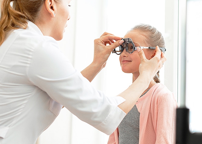 girl getting an eye exam